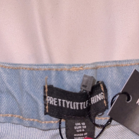 PRETTYLITTLETHING Shape Bleach Wash Ripped Hem Denim Shorts - Picture 9 of 10